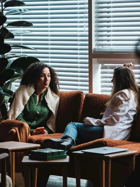 Two talent managers reviewing creator partnerships together